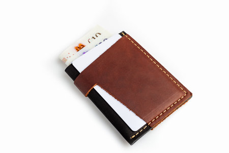 Brown leather wallet with blank cards, isolated on white backgroundの写真素材