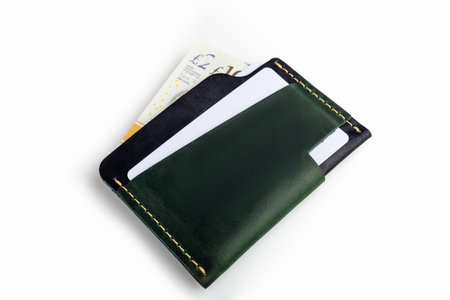 Green leather wallet with blank cards, isolated on white backgroundの写真素材