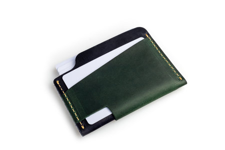 Green leather wallet with blank cards, isolated on white backgroundの写真素材