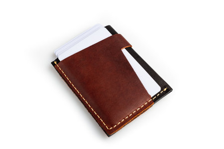 Brown leather wallet with blank cards, isolated on white backgroundの写真素材
