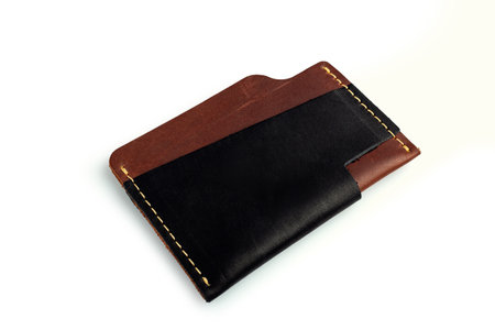 Black leather wallet with blank cards, isolated on white backgroundの写真素材