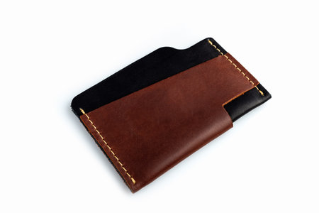 Brown leather wallet with blank cards, isolated on white backgroundの写真素材