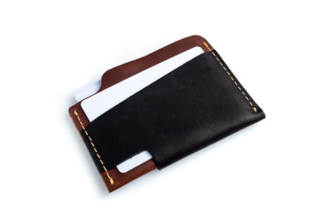 Black leather wallet with blank cards, isolated on white backgroundの写真素材