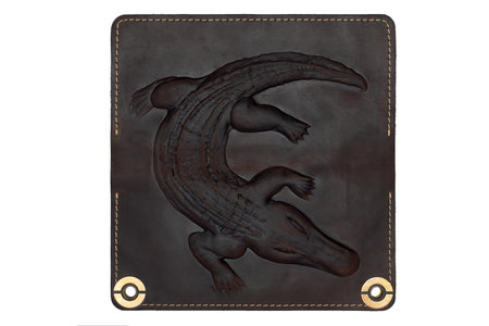 Big brown leather wallet on a button on a white background, crocodile print. top viewの写真素材