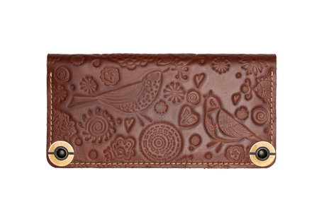 Big brown leather wallet on a button on a white background, birds print. top viewの写真素材