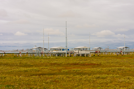 Industrial zone in the Far North in the autumn of the Arctic Circle on a sunny dayの写真素材