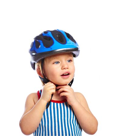 Little boy dress off a protective bikers helmetの写真素材