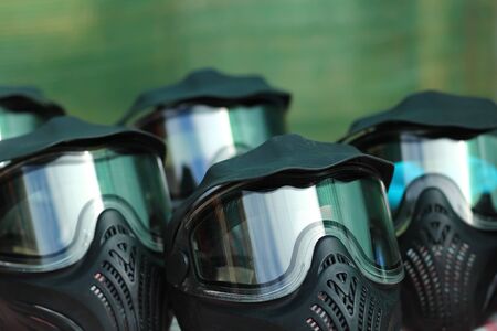 Closeup of paintball game battle full face protective masksの写真素材