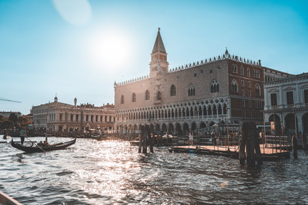 Historic palace on waterfront in backlightの写真素材