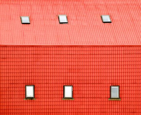 Red roof background with windows.の写真素材