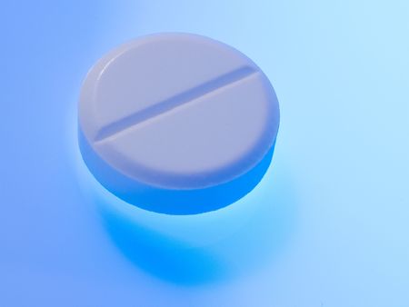 Tablet on abstract colored background.