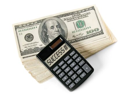 Money and calculator isolated on white background.の写真素材