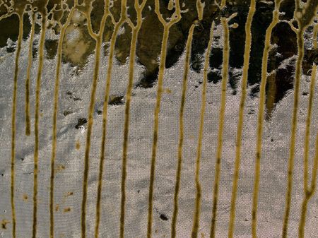 Abstract grungy painted texture closeup background with vertical burr paint.
