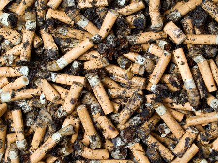 Cigarettes end closeup background.の写真素材