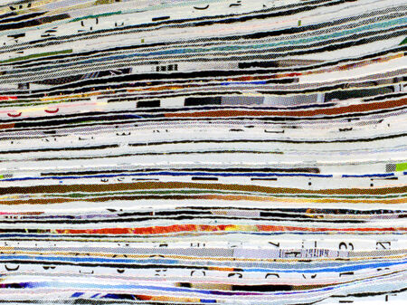 Cut printed paper closeup background.の写真素材