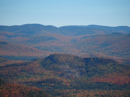 Mountain landscape with autumn forest. View from the top of the mountain.の写真素材