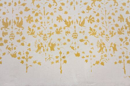 Texture old white stucco with yellow small pattern. Space for text. Horizontal photoの写真素材