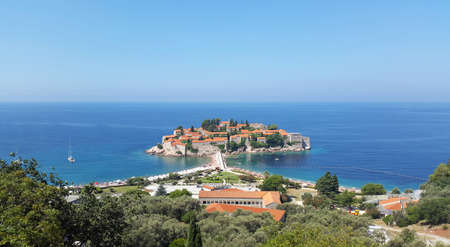 Sveti Stefan island - Adriatic sea near Montenegro coast - blue sea under clear sky at sunny dayのeditorial素材