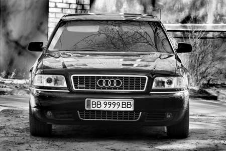 Chernihiv, Ukraine - March 31, 2020: Black business car Audi A8 in the city. Black and white photoのeditorial素材