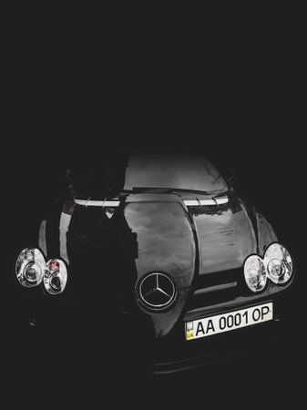March 7, 2011 - Kiev, Ukraine: Black Mercedes-Benz SLR McLaren in the shadowsのeditorial素材