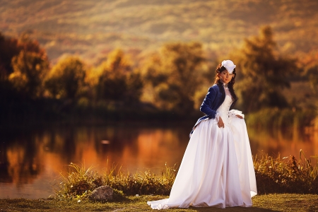 Gorgeous brunette beauty in a old-fashioned dress の写真素材