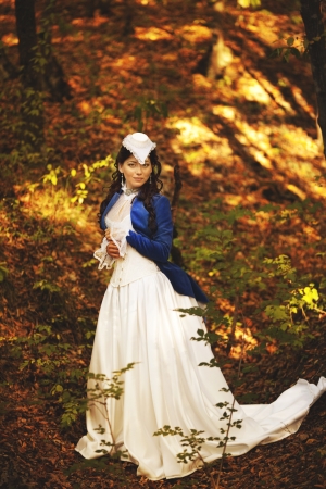 Gorgeous brunette beauty in a old-fashioned dress の写真素材