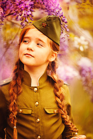 cute little girl in a military uniformの写真素材