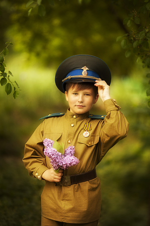 Boy with a girl in military uniform.day of victoryの写真素材