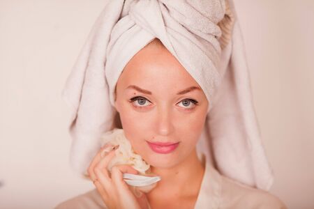 Spa skin care beauty woman wearing hair towel after beauty treatment.