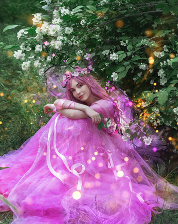 flower Fairy. Girl in pink air dress.の写真素材