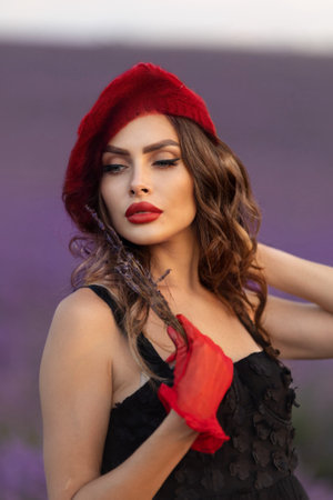 Beautiful girl is wearing fashion dress at field of lavender. Provenceの写真素材