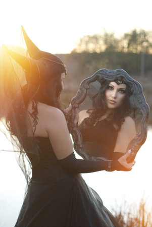 portrait art fantasy gothic beautiful young woman with horns on her head. levitation power forest...