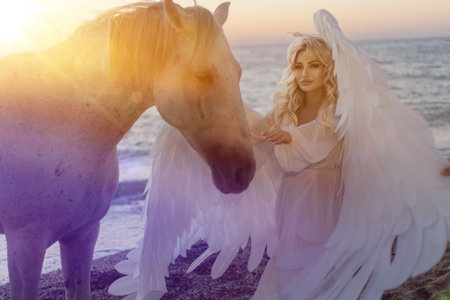Young long hair woman in white shirt riding white horse on seascape background