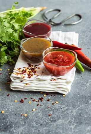 Traditional georgian sauces on stone background on stone backgroundの写真素材