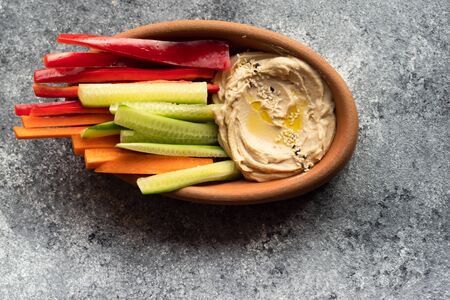hummus vegetarian dish on Rustic background with copy space