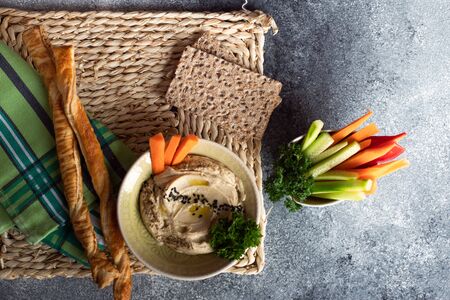 hummus vegetarian dish on Rustic background with copy spaceの写真素材