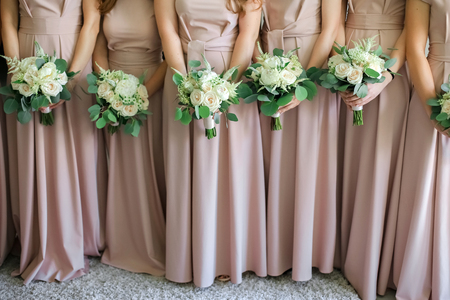 Bridesmaids with bouquets.の写真素材