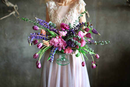 Large bouquet in the hands of the bride.の写真素材