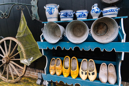 ZAANSE SCHANS, NETHERLANDS. November 2020. Dutch traditional colorful handmade wooden shoes, clogs with colorful paintings, symbol of Netherlands .のeditorial素材