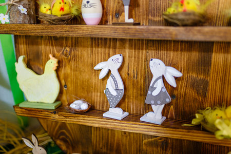 Easter decorative elements, painted eggs, wooden hen, bunny and chicken toys