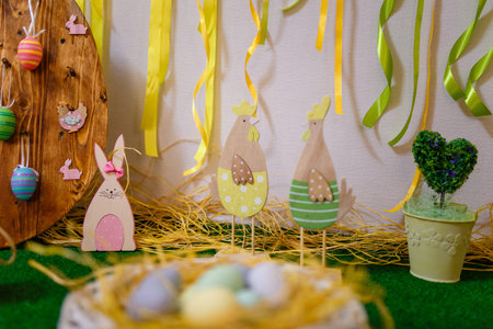 Easter decorative elements, painted eggs, wooden hen, bunny and chicken toys
