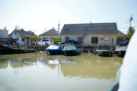 Vilkovo, Ukraine - August 2019. Town on water with buildings and boats. のeditorial素材