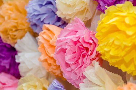 Paper flowers, colorful floral decorationsの写真素材
