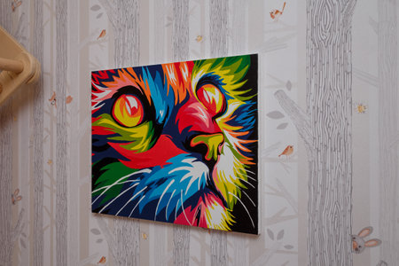 Izmail, Ukraine. March 2021. Beautiful multicolored cat picture, illustration in children room, moredn interior design. Bright colors in child bedroom furnishings.のeditorial素材