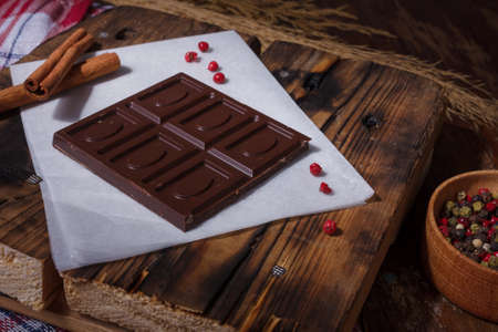 Bar of chocolate with red hot aroma pepper flavorの写真素材