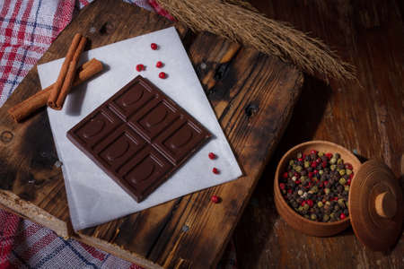 bar of chocolate with red hot aroma pepper, spice flavored sweet dessertの写真素材