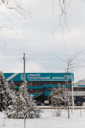 Izmail, Ukraine. February 2022. Building of maritime or river station in winter, some trees covered with snow, beautiful cityscapeのeditorial素材