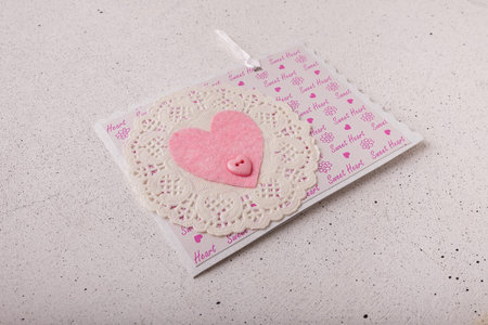 14 February Valentines day postcard with pink heart on white backgroundの写真素材