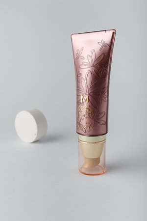 Izmail, Ukraine. March 2022. MISSHA SPF 25 BB Cream tube on white background. Face skin care and make up decorative cosmeticsのeditorial素材