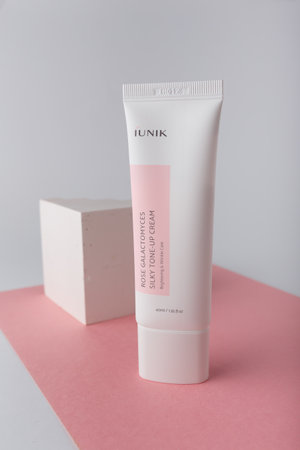Izmail, Ukraine. March 2022. IUNIK Rose Galactomyces silky tone-up cream. Brightening and wrinkle care. Face skin Korean cosmeticsのeditorial素材